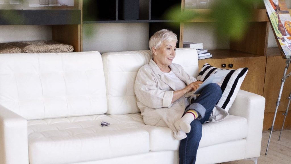 woman-working-on-sofa